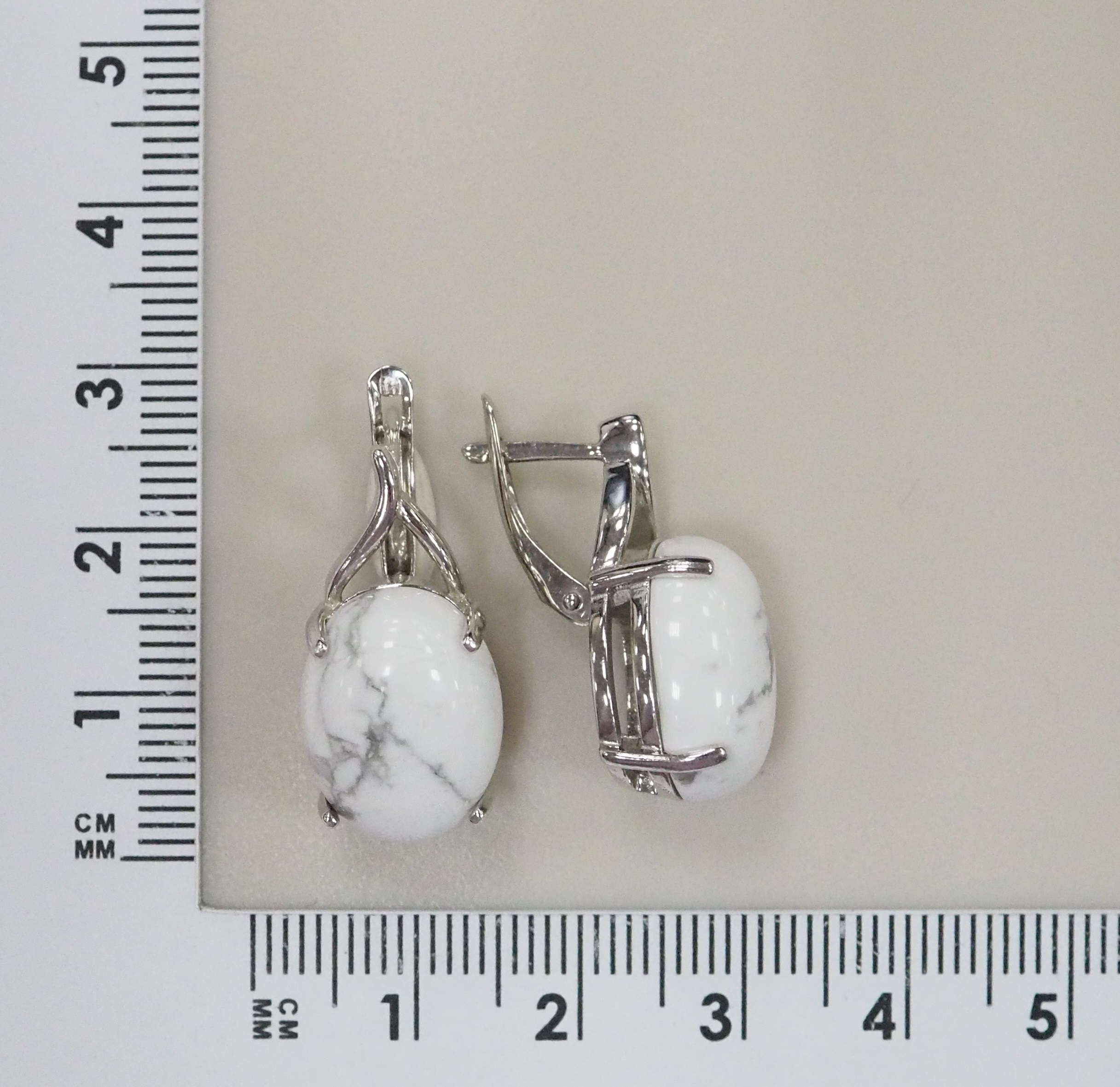 Серебряные серьги с кахолонгом